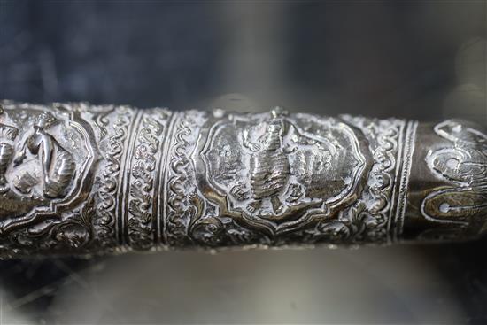 A Burmese embossed silver horn-shaped scroll holder and cover on hardwood stand, 41.5cm